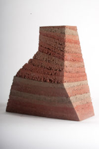 Disruption - a rammed earth sculpture by Briony Marshall